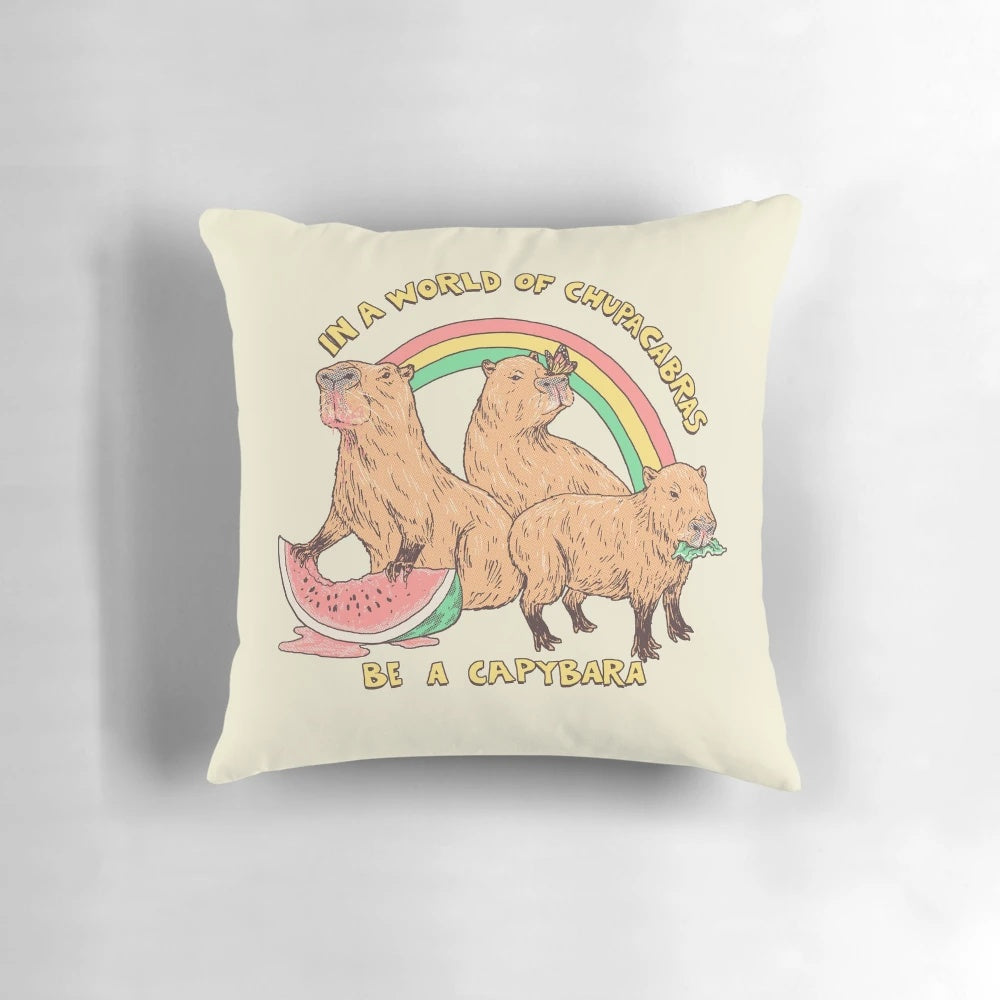 Plush capybara-shaped pillow in a retro, rainbow-colored design