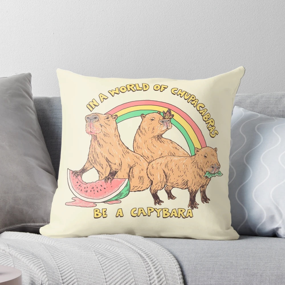 Plush capybara-shaped pillow in a retro, rainbow-colored design
