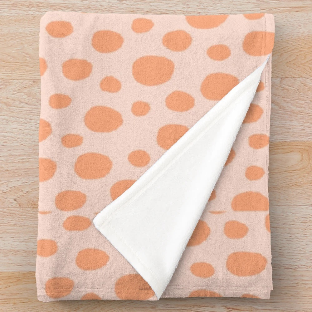 Cheetah skin plush blanket with soft, cozy texture