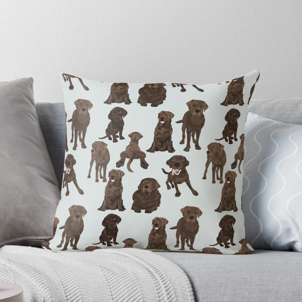 Adorable chocolate labrador retriever dog on a plush pillow