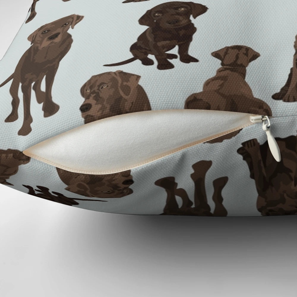 Adorable chocolate labrador retriever dog on a plush pillow