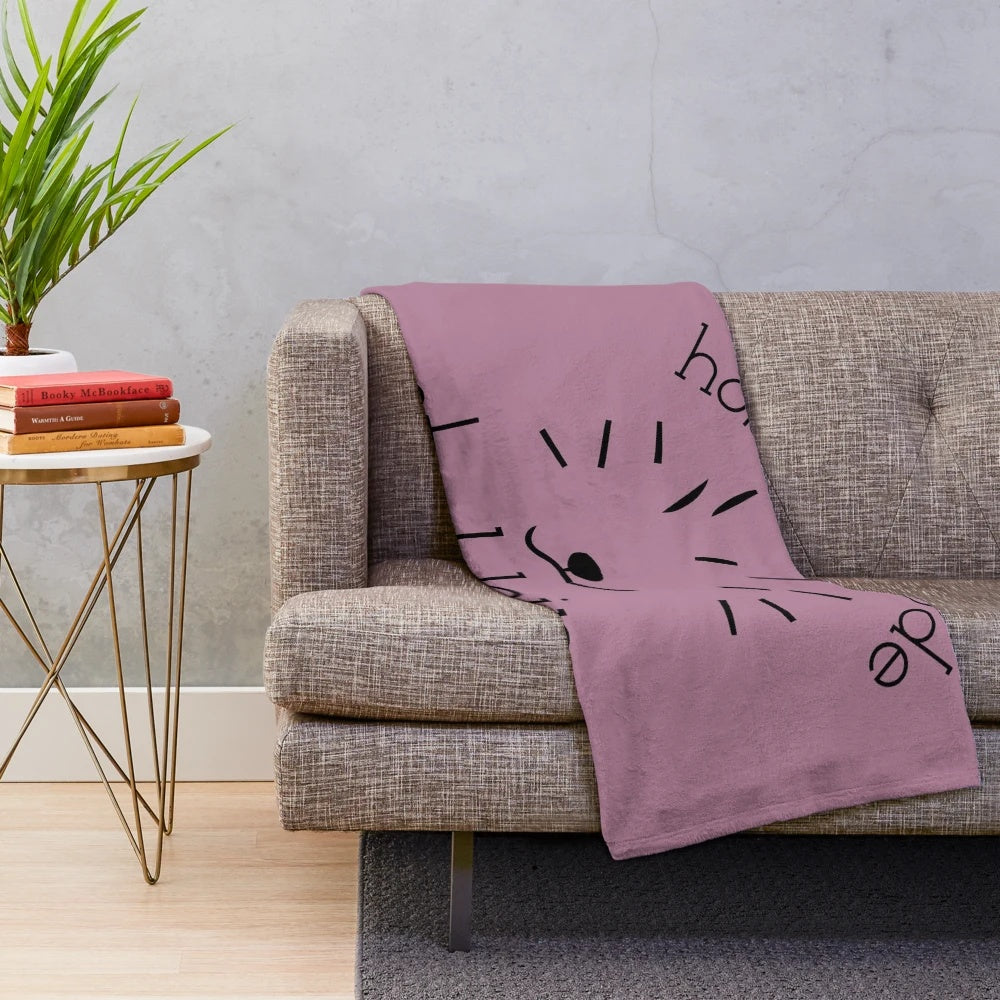 A soft and cozy plush blanket featuring a hedgehog design, perfect for exotic pet lovers.