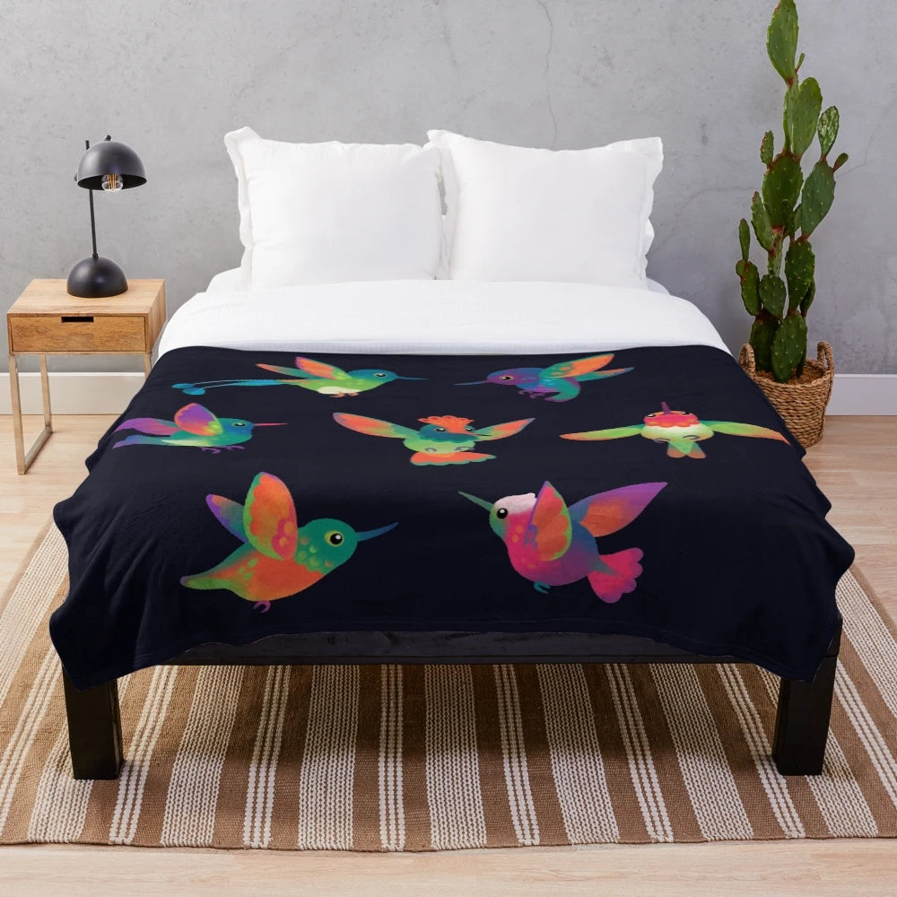 Hummingbird plush blanket with vibrant colors and intricate design