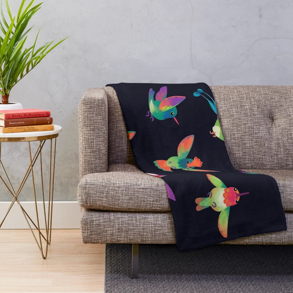 Hummingbird plush blanket with vibrant colors and intricate design