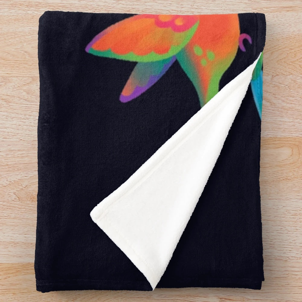 Hummingbird plush blanket with vibrant colors and intricate design