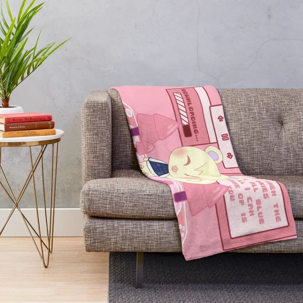 Bubblegum-colored plush blanket featuring the character Marshal from the popular video game Animal Crossing