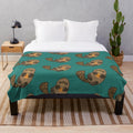 Orange plush blanket with a cute platypus design