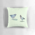 A cozy throw pillow featuring a pair of adorable pigeons in a natural setting.