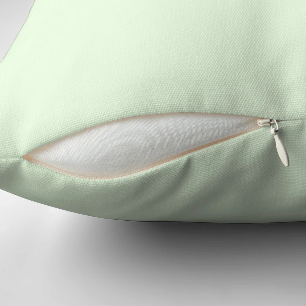A cozy throw pillow featuring a pair of adorable pigeons in a natural setting.