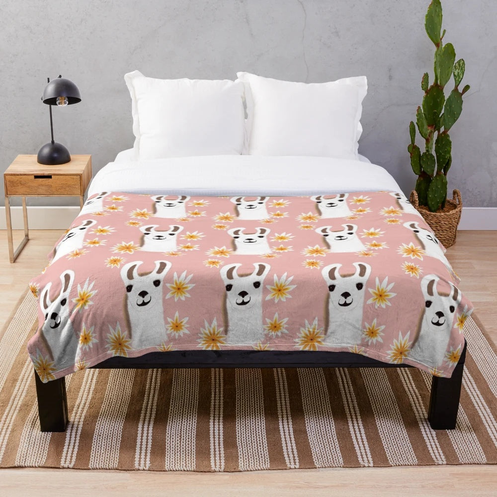 Pink plush blanket with a cute llama design