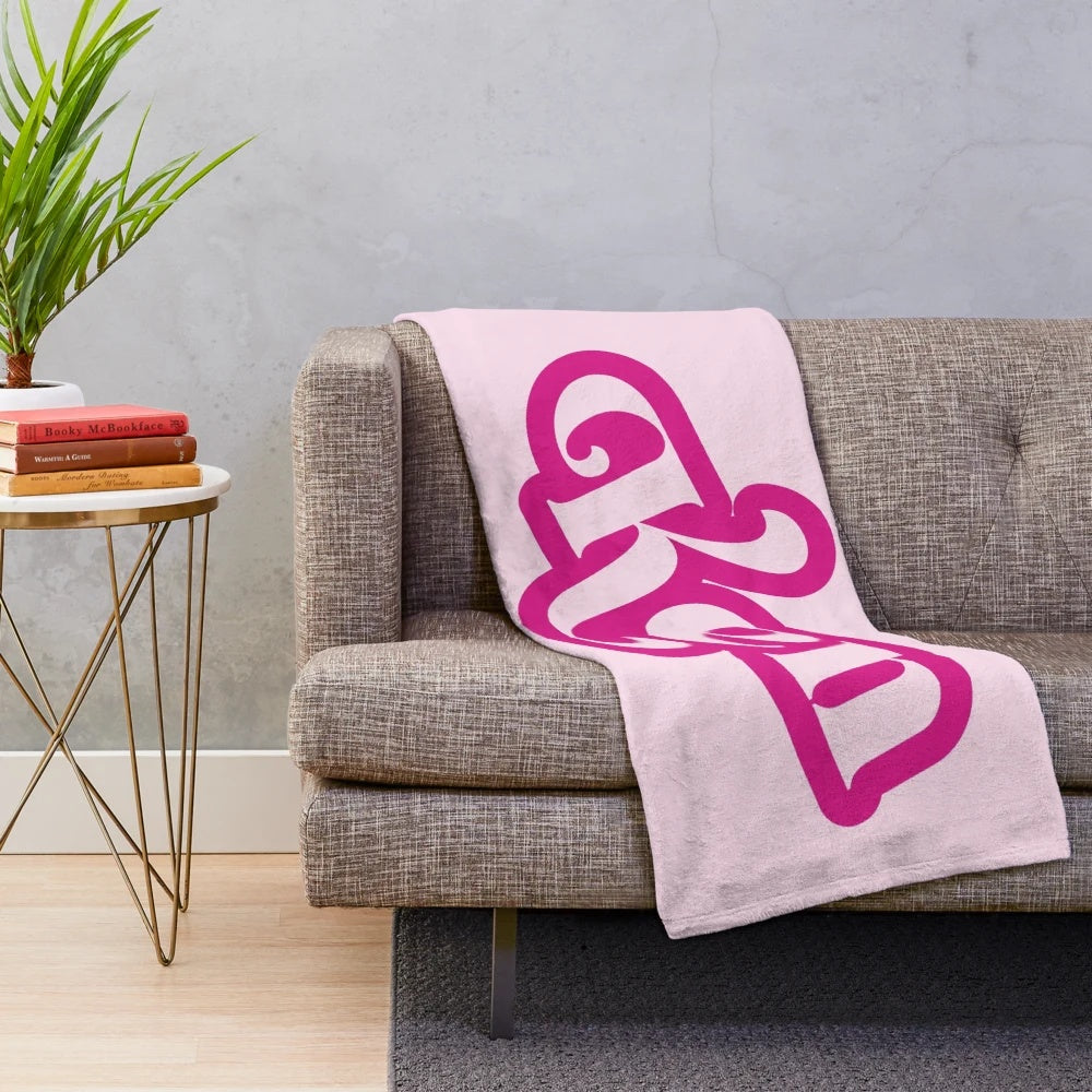 Pink plush blanket with Ken doll design