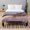 Cozy plush blanket featuring a beautiful bengal cat or asian leopard cat with striking spots and green eyes