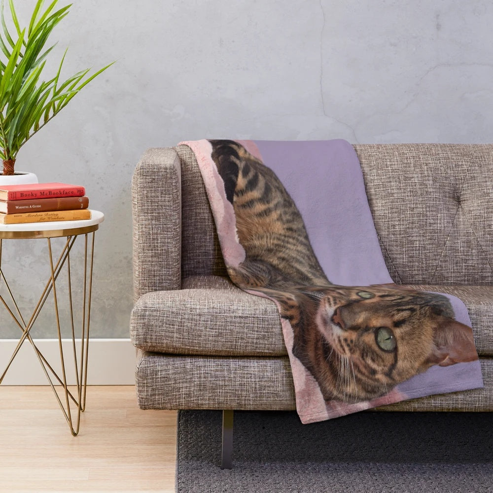 Cozy plush blanket featuring a beautiful bengal cat or asian leopard cat with striking spots and green eyes