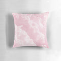 A soft and fluffy pink clouds pillow with a minimalist, aesthetic design perfect for a cozy and dreamy bedroom.