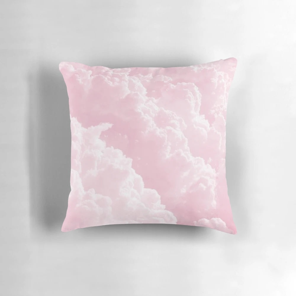 A soft and fluffy pink clouds pillow with a minimalist, aesthetic design perfect for a cozy and dreamy bedroom.