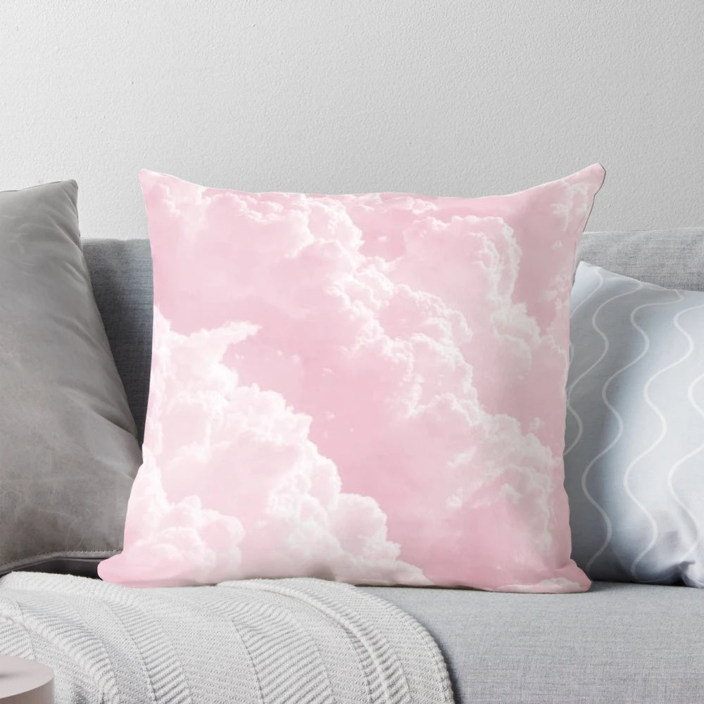 A soft and fluffy pink clouds pillow with a minimalist, aesthetic design perfect for a cozy and dreamy bedroom.