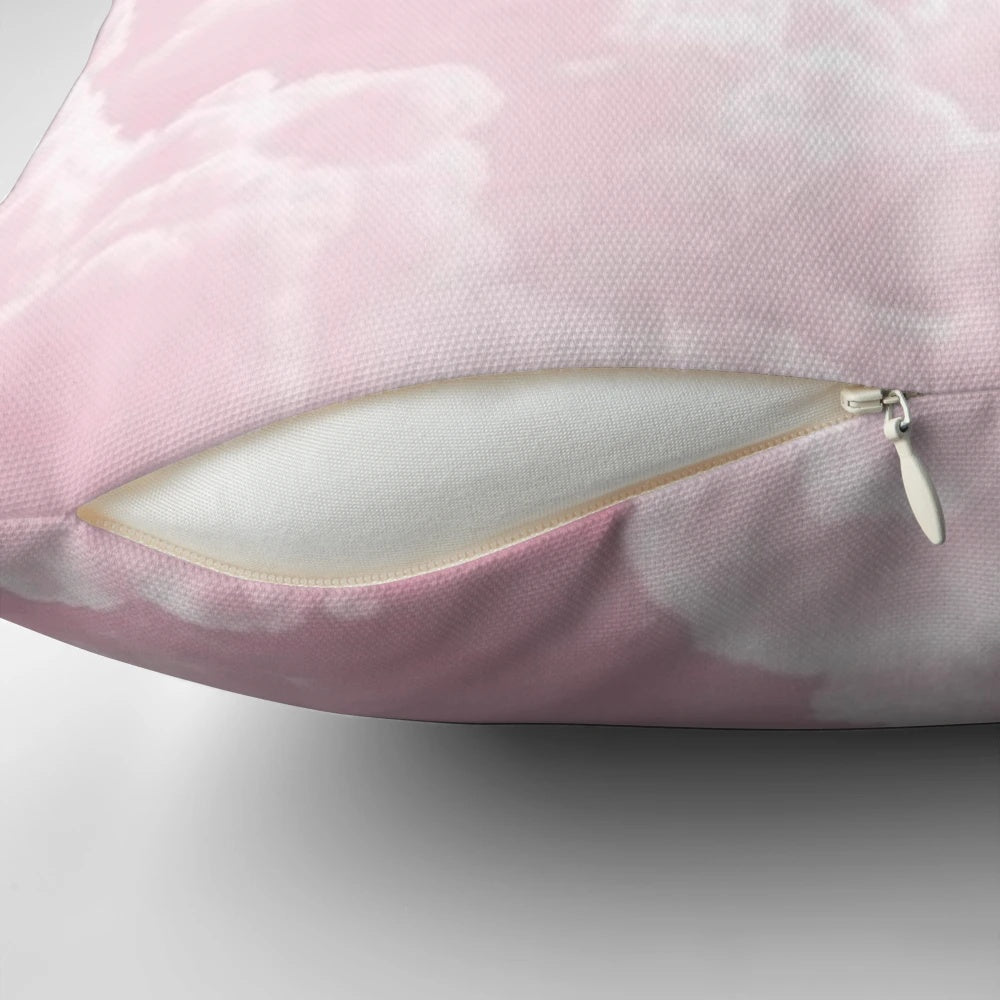 A soft and fluffy pink clouds pillow with a minimalist, aesthetic design perfect for a cozy and dreamy bedroom.