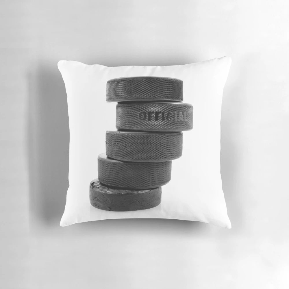 Cozy and Stylish Ice Hockey Pucks Pillow Featuring a Black and White Design