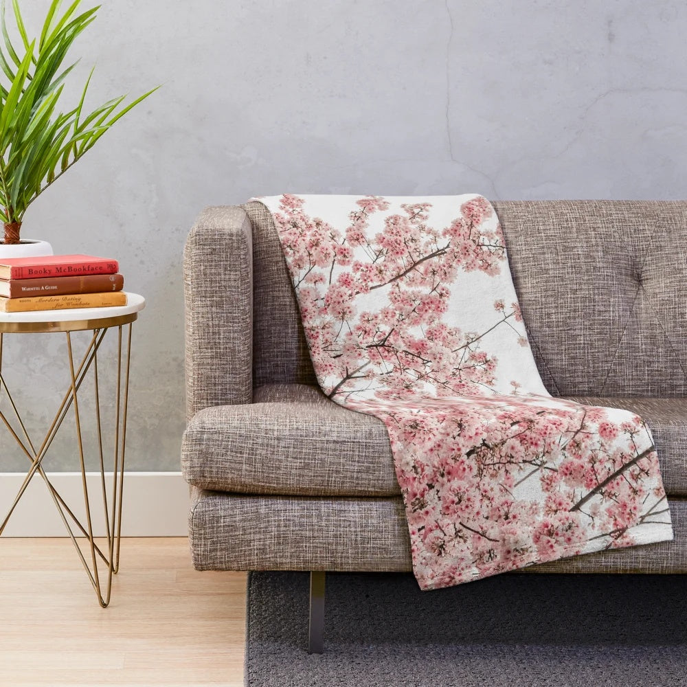 Soft and cozy plush blanket with a minimalist Japanese cherry blossom design