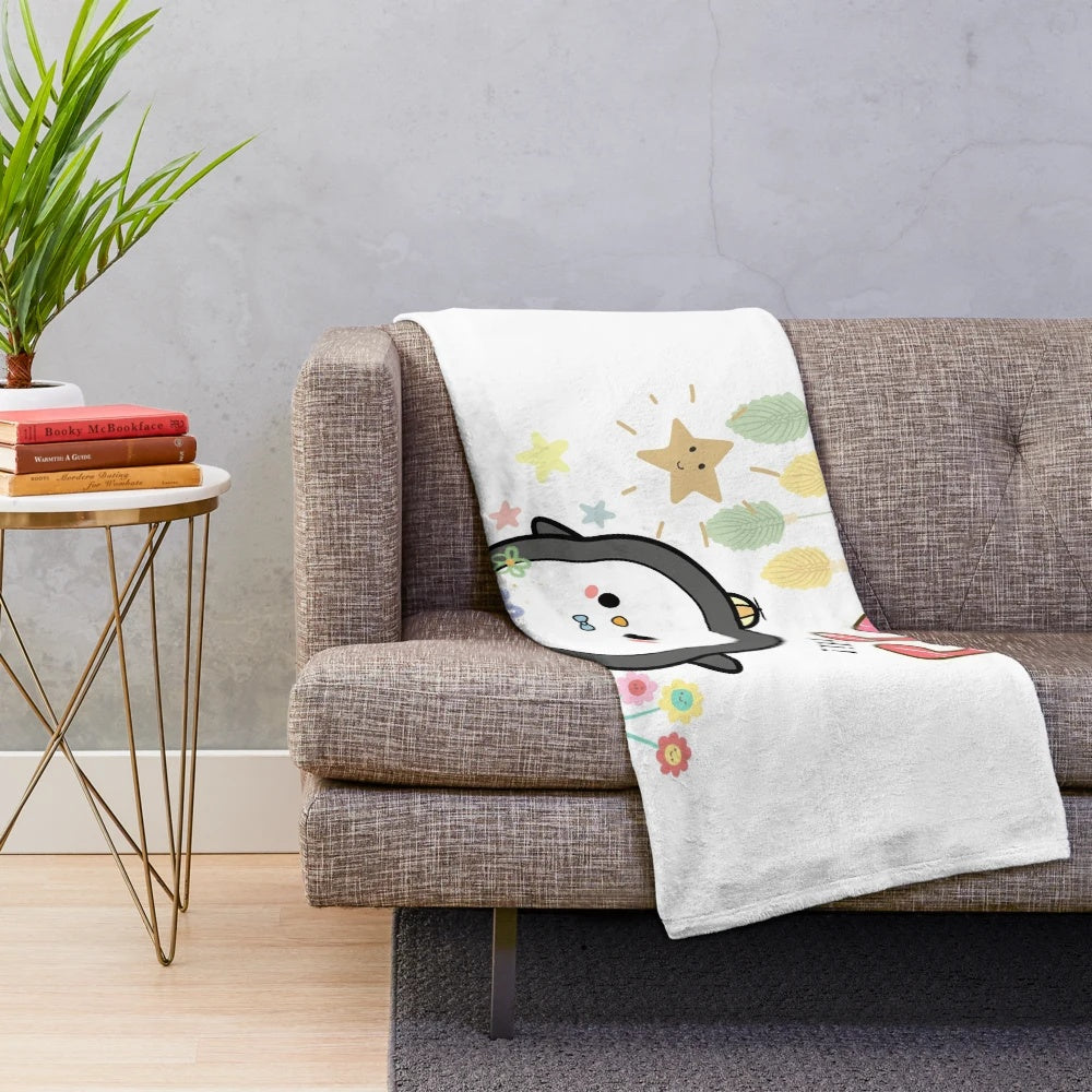 Soft and cozy penguin plush blanket with musical notes and floral design