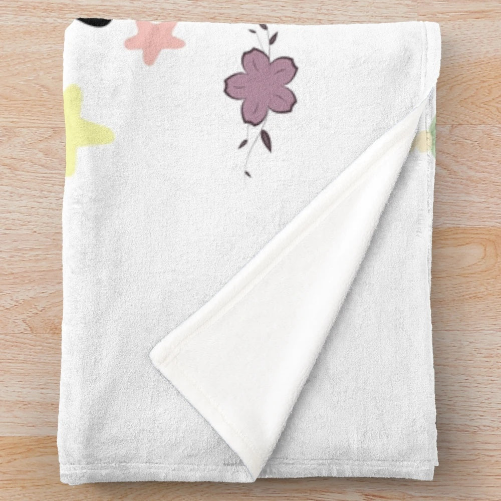 Soft and cozy penguin plush blanket with musical notes and floral design