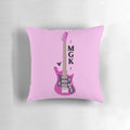 Vibrant pink guitar-shaped pillow featuring the logo of punk singer Machine Gun Kelly