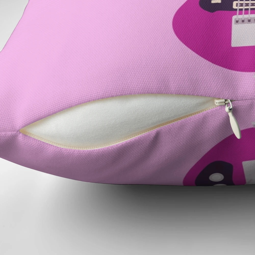 Vibrant pink guitar-shaped pillow featuring the logo of punk singer Machine Gun Kelly