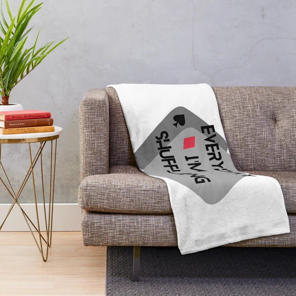 Plush blanket with "EVERY DAY IM SHUFFLING" design