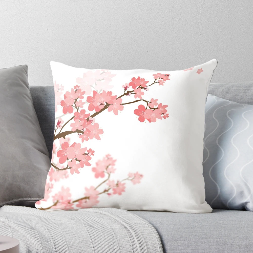 Soft, pink cherry blossom flower design printed on a comfortable throw pillow