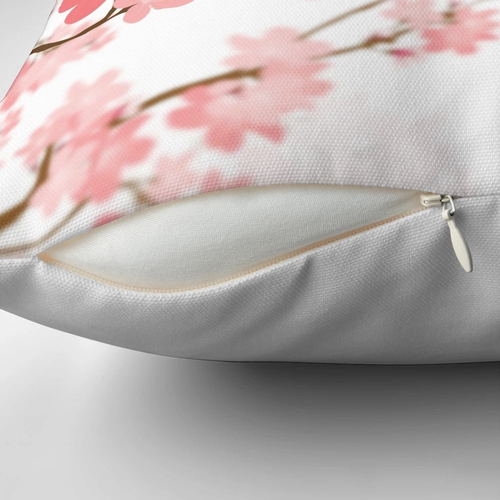 Soft, pink cherry blossom flower design printed on a comfortable throw pillow
