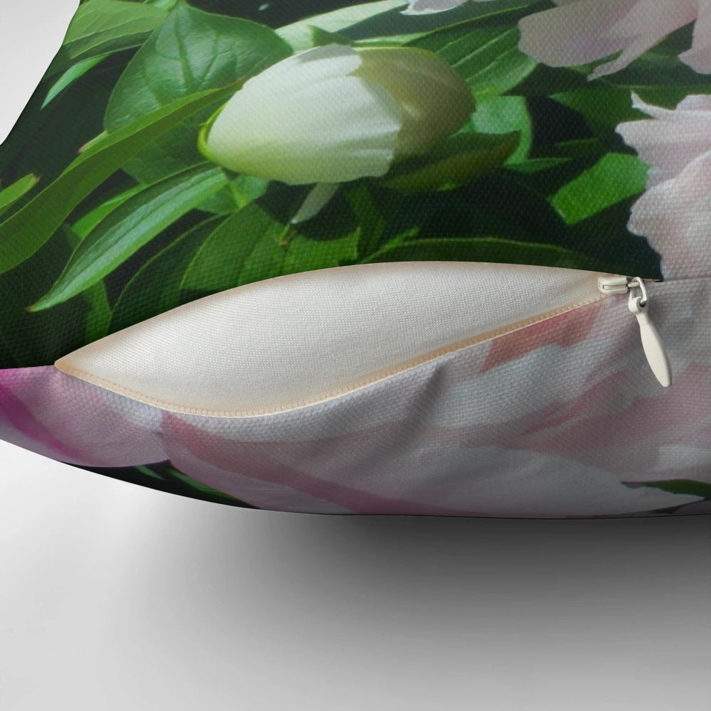 Lush pink peony flowers on a soft, plush throw pillow