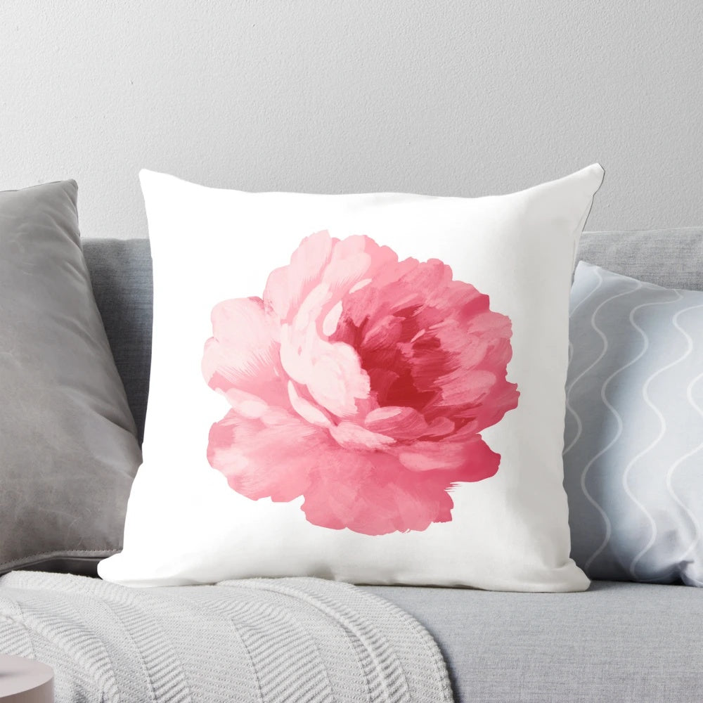 A soft and decorative pink peony floral pillow perfect for adding a touch of nature to your home.