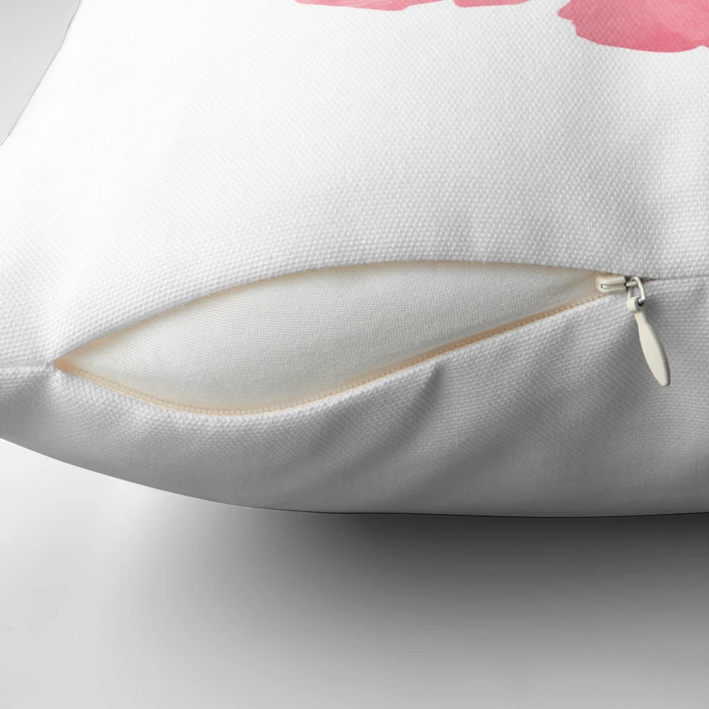 A soft and decorative pink peony floral pillow perfect for adding a touch of nature to your home.