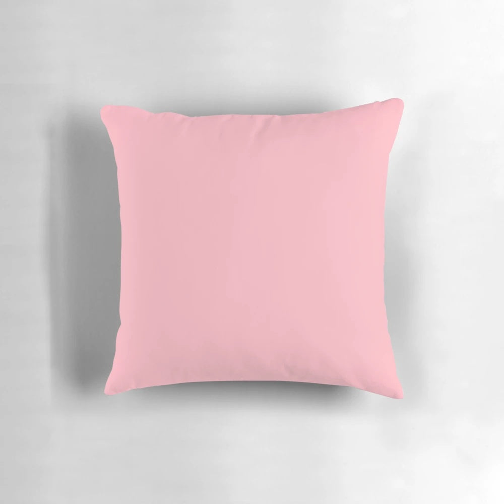 Soft pink pillow with various shades of pink