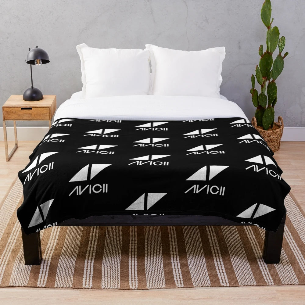 Soft and cozy plush blanket featuring the Avicii logo and design