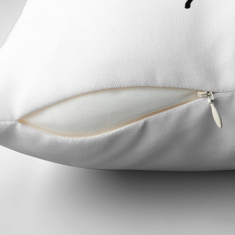 Soft, plush pillow with a cake and ant design, perfect for decorating and cuddling.