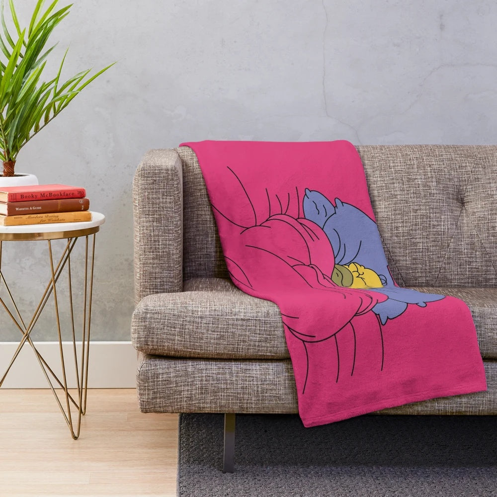 Soft and cozy plush blanket in the shape of a cinnamon bun