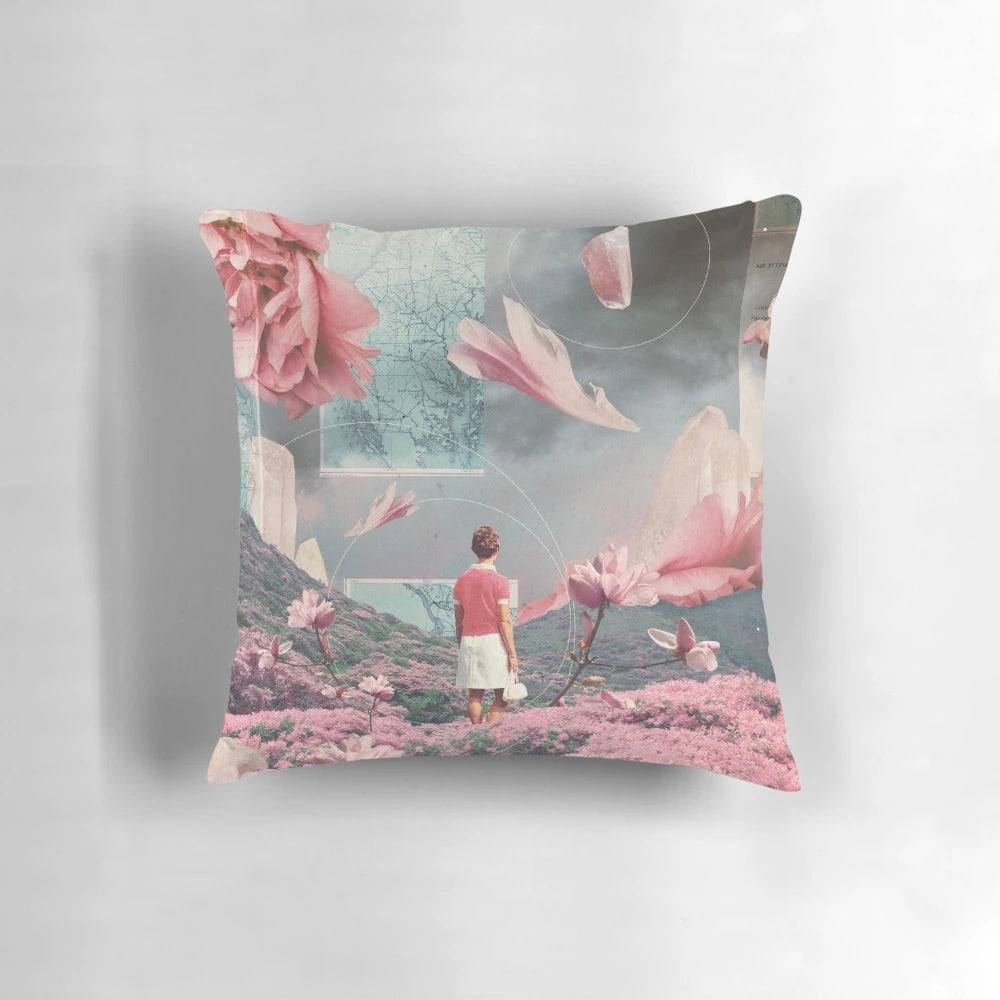 Soft, pastel-colored pillow with a surreal collage design featuring a woman in a floral landscape, symbolizing acceptance of distance and life's journey.