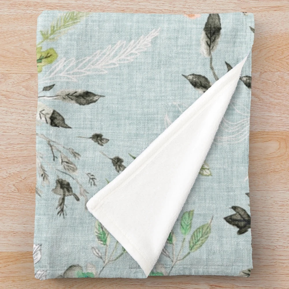 Soft and delicate blue floral plush blanket for a romantic, boho-inspired bedroom