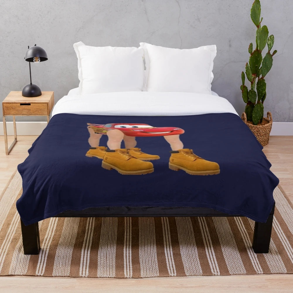 Soft and cozy plush blanket featuring a design of the character Lightning McQueen from the Cars movie