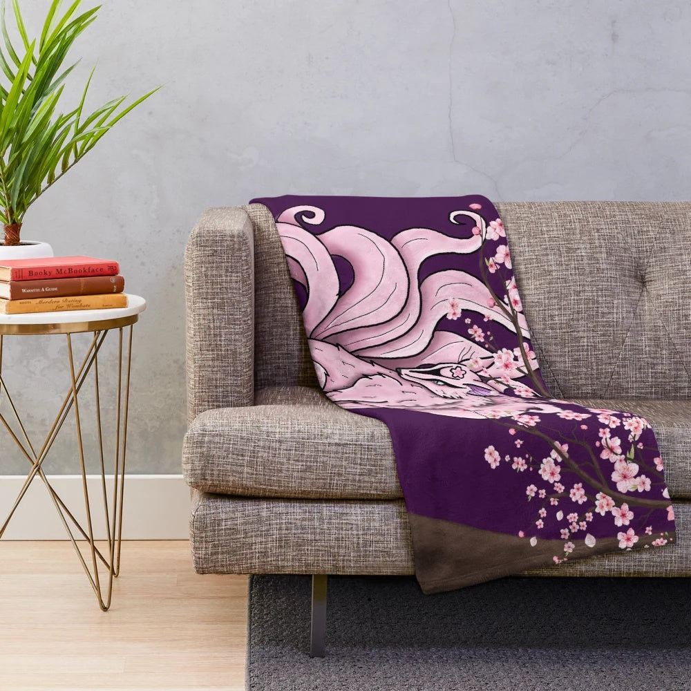 Cherry blossom plush blanket with anime-style nine-tailed fox design
