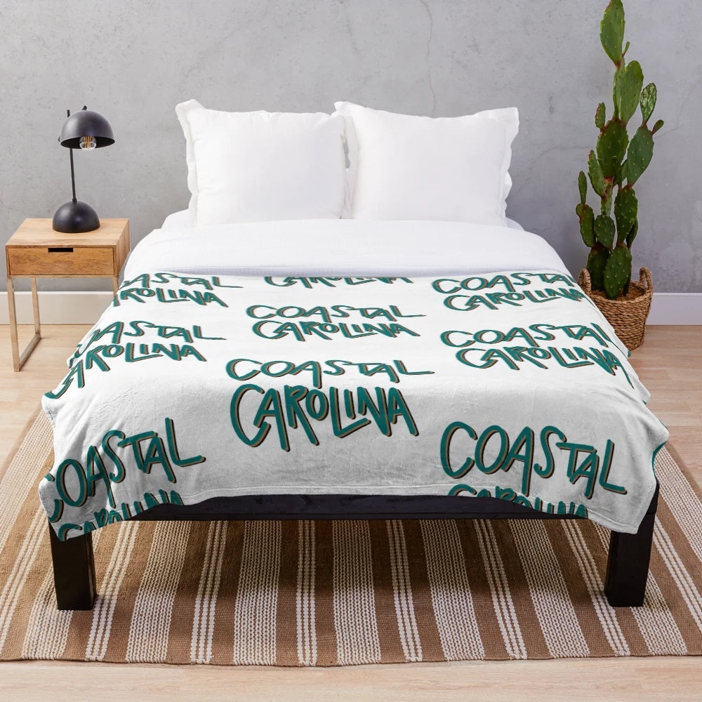 Coastal Carolina plush blanket in blue and white colors