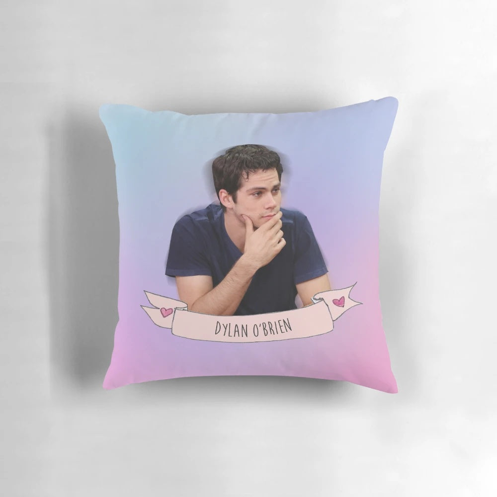 Soft and plush pillow featuring a watercolor portrait of actor Dylan O'Brien as Stiles Stilinski from the TV series "Teen Wolf"