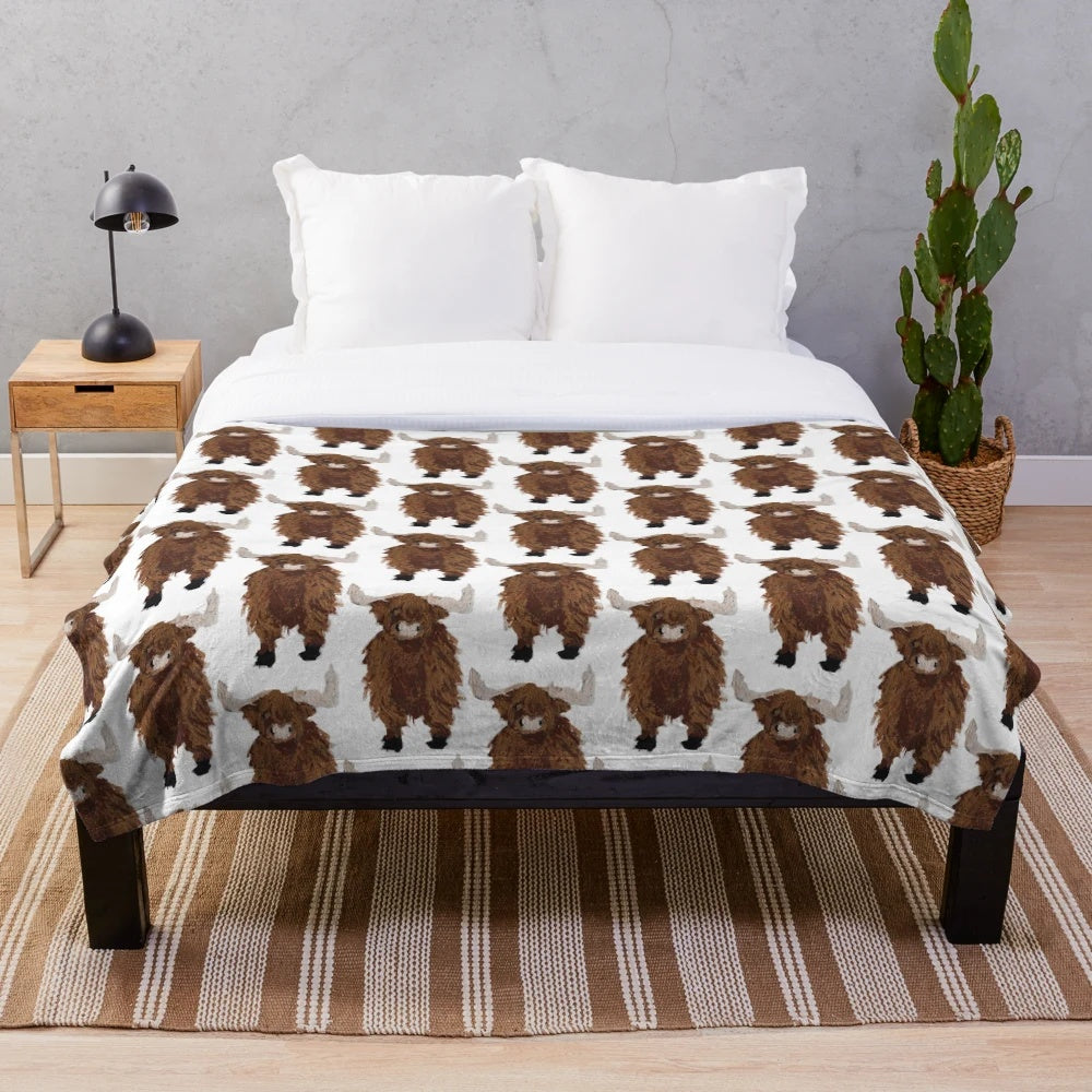 Soft and cuddly highland cow plush blanket