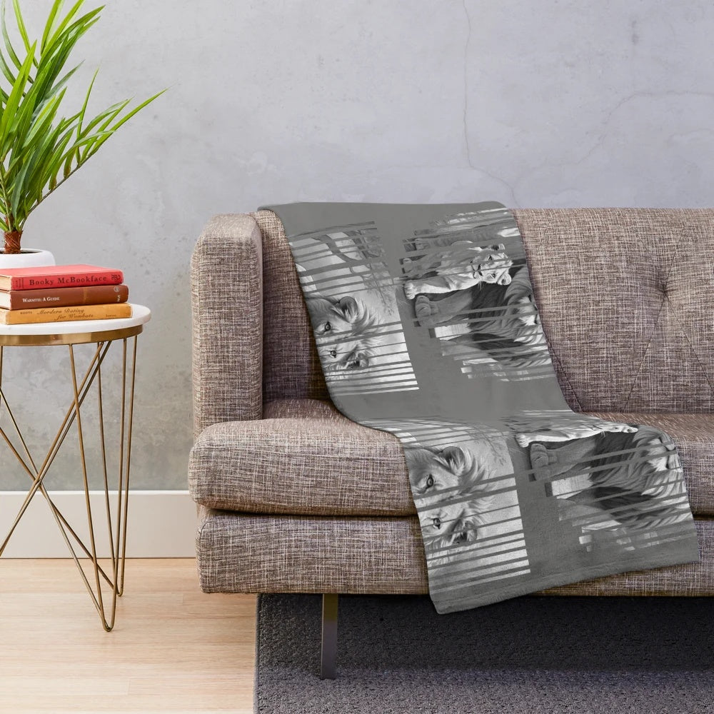 Soft and cozy plush blanket featuring a vibrant jungle animals design