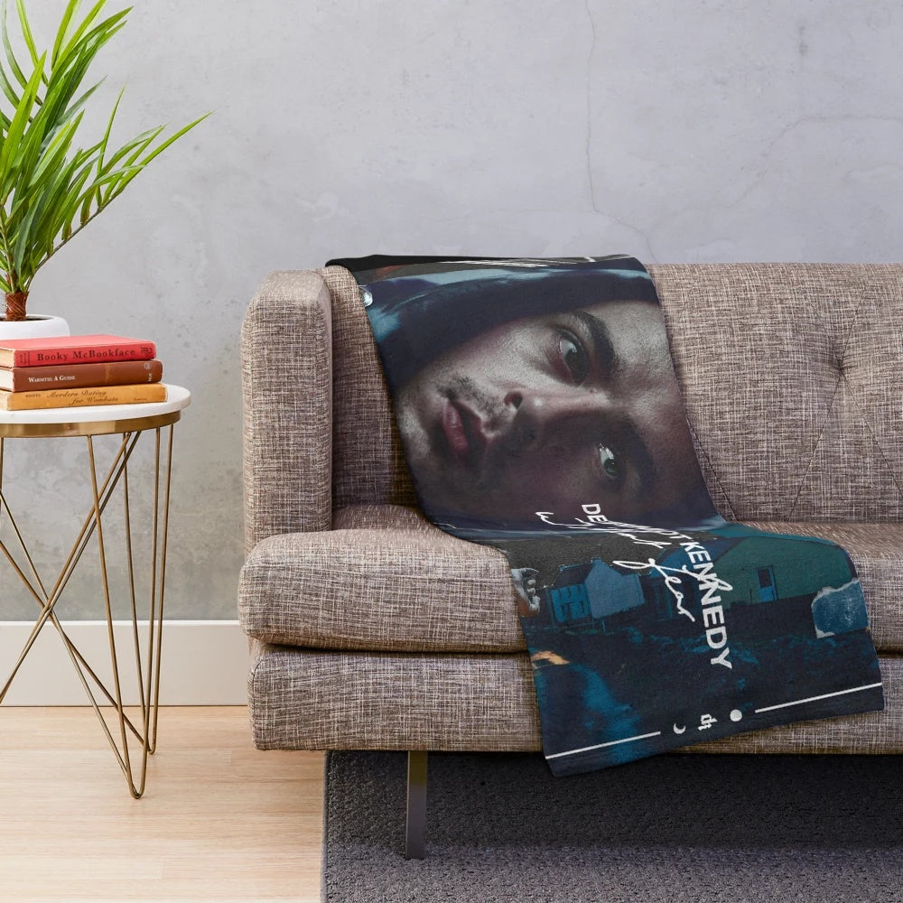 Soft and plush blue and white blanket with kennedy inspired design