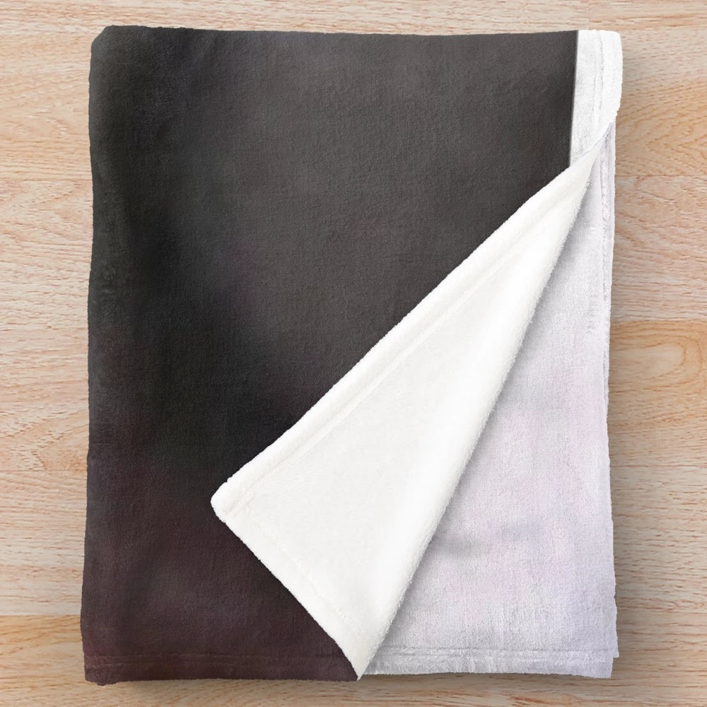 Soft and plush Le Monke blanket with a cute monkey design, perfect for snuggling