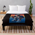 Plush blanket featuring a whimsical monkey sipping a drink