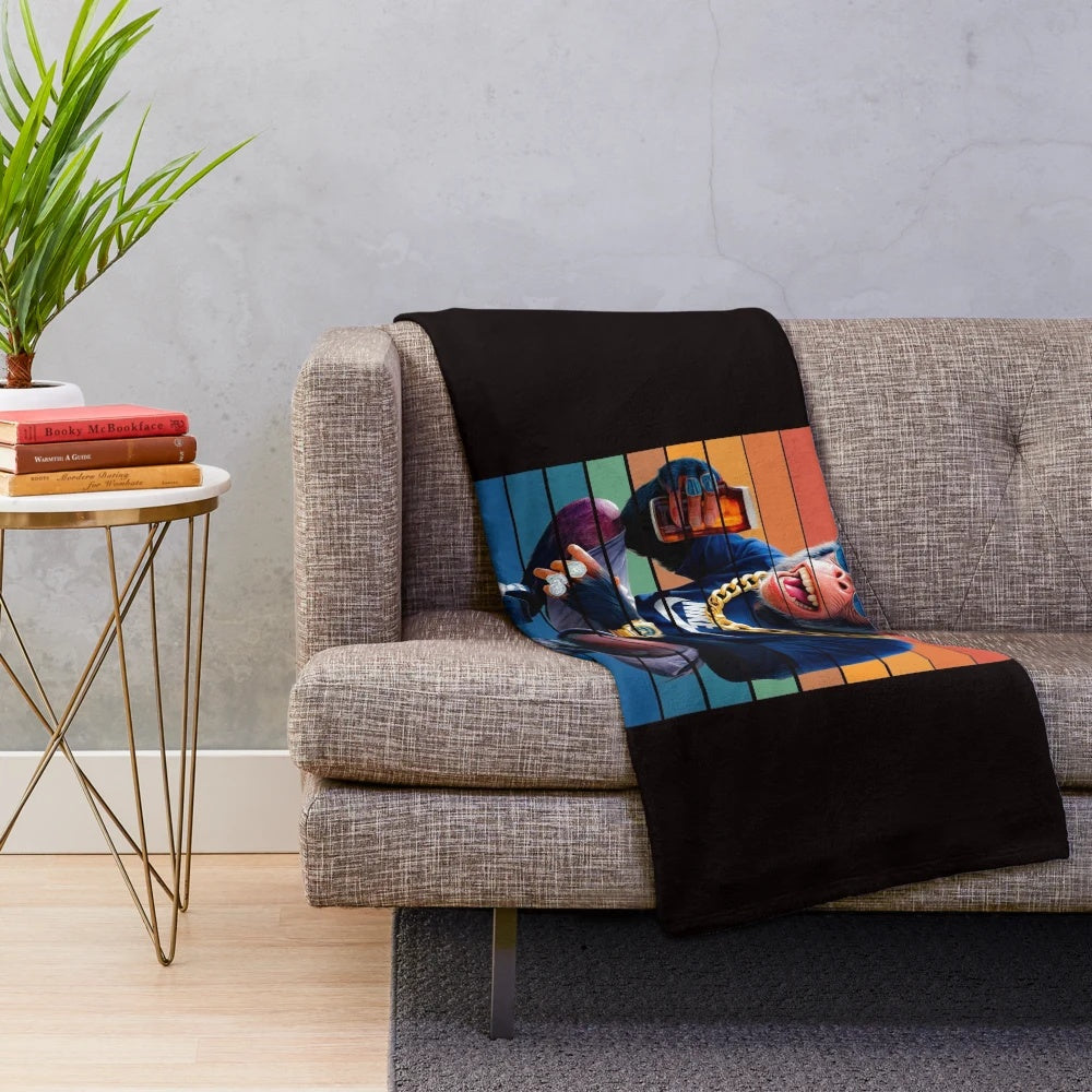 Plush blanket featuring a whimsical monkey sipping a drink