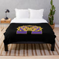 Omega Psi Phi fraternity plush blanket in purple and gold colors